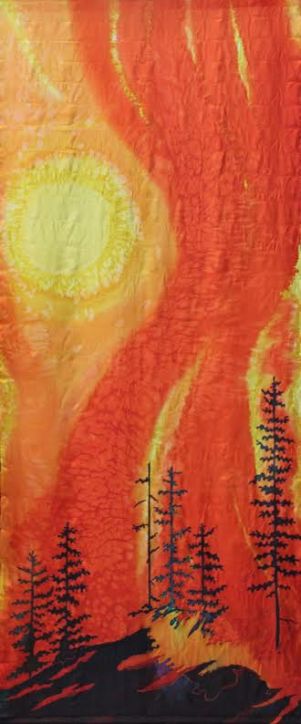 Silk painting of a wall of fire sweeping through a forest.